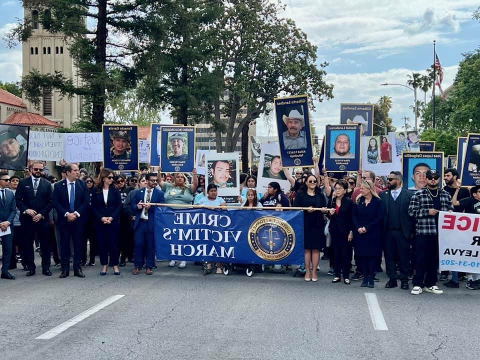 People participating in the 10th Annual Crime Victims March